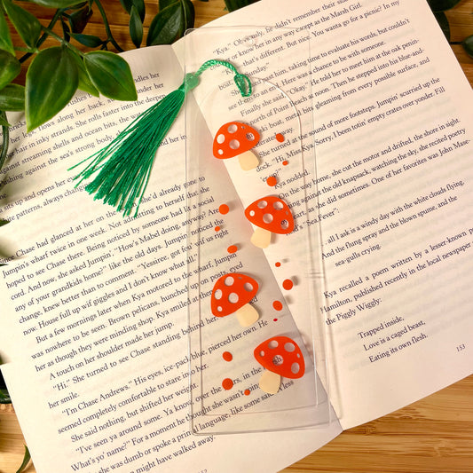 Bookmark with mushroom design on a book