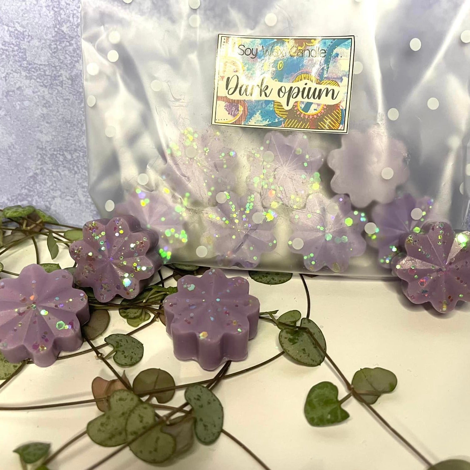 Dark opium scented soy wax melts . shaped flowers